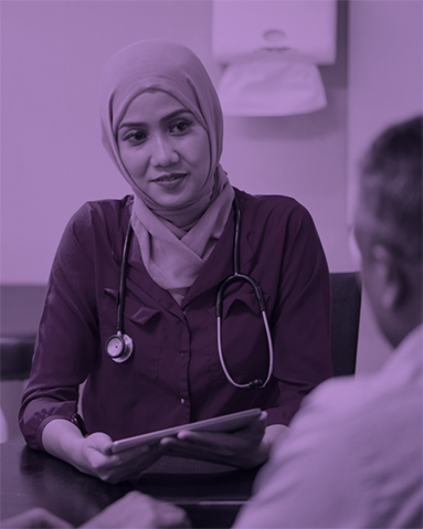 A female GP wearing a hijab and stethoscope smiles at a patient in the distance. The image has a purple filter.
